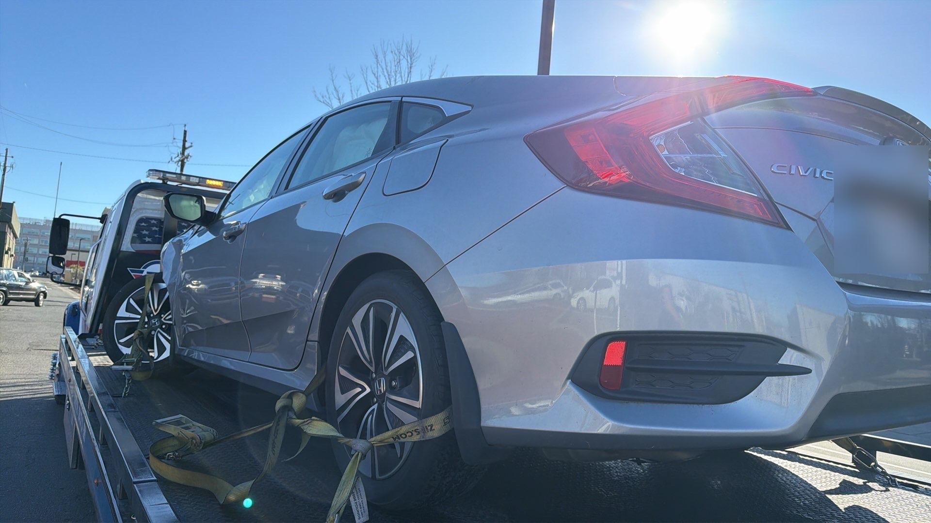 Light-duty car secured on Fleet Nation flatbed