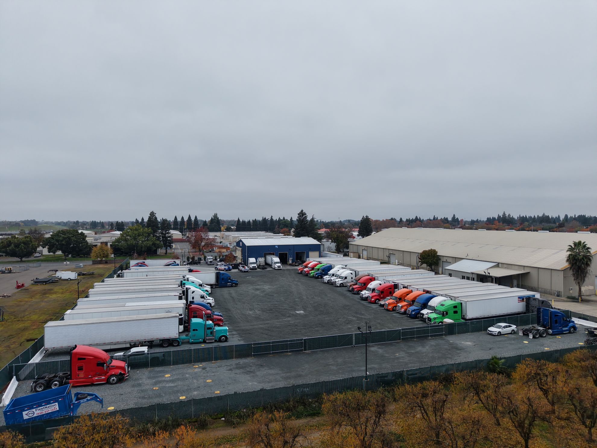 Fleet Nation secure 24/7 yard with parked tractors and trailers